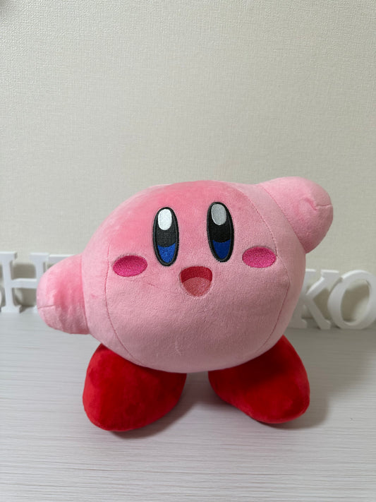 Peluche Kirby mano arriba